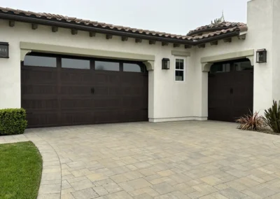 C.H.I. Stamped Carriage House Long Panel in the Walnut Accent Woodtone and Oversized Insulated Seeded Glass Windows with Blue Ridge Decorative Hardware